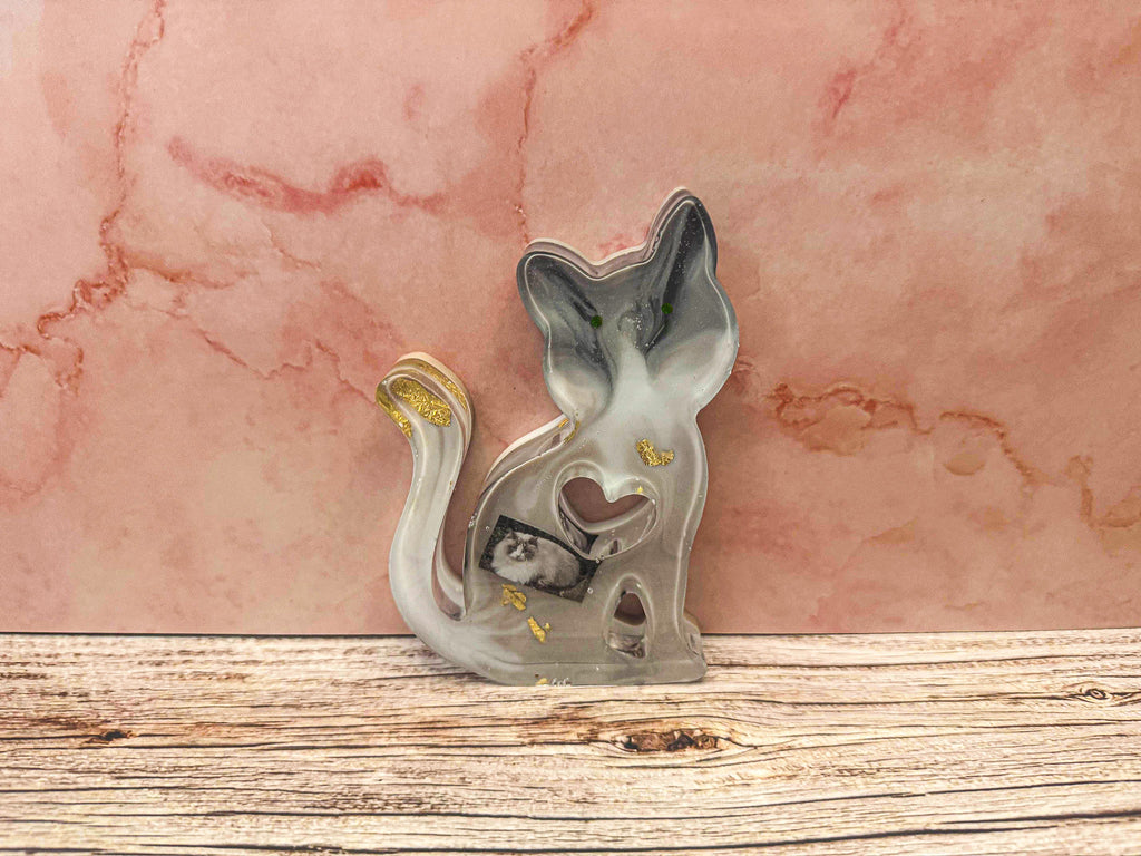 Erinnerungsstück "Seitlich sitzende Katze"